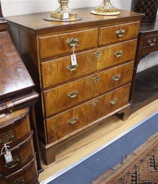 A George II walnut chest of five drawers W.95cm